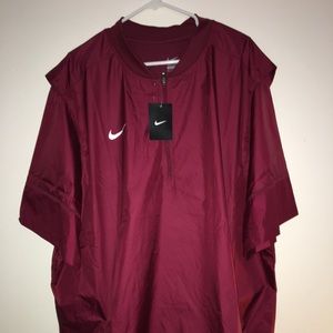 Brand New Nike men’s burgundy short-sleeve jacket.